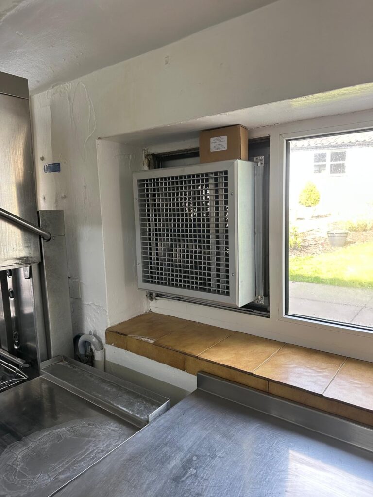 Horseshoe inn air intake fresh air replacement fan in pub kitchen